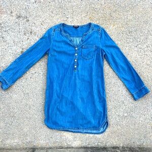 Blue denim button-up dress with a relaxed fit #denimdress